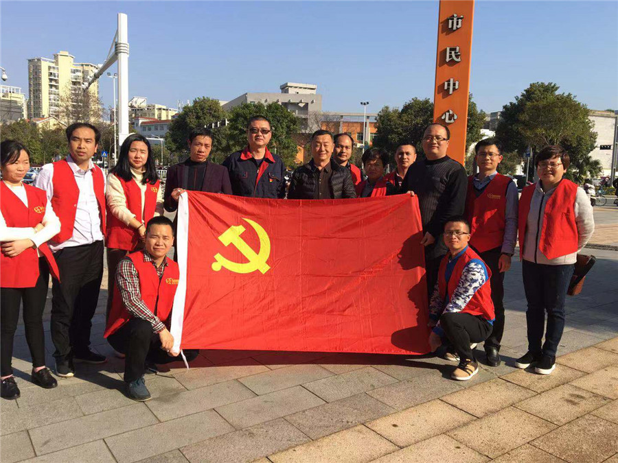 学院第四党支部开展社区志愿学雷锋活动